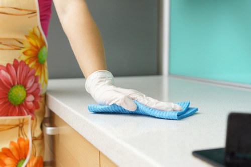 Vacuuming a mattress to remove dust and allergens